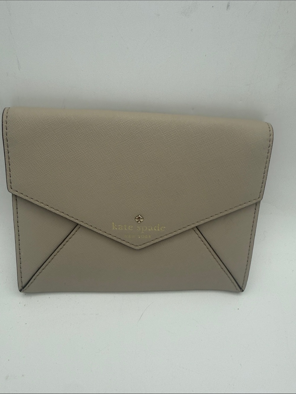 taupe Kate Spade Cedar Street envelope crossbody bag No strap 6.5 x5.25”